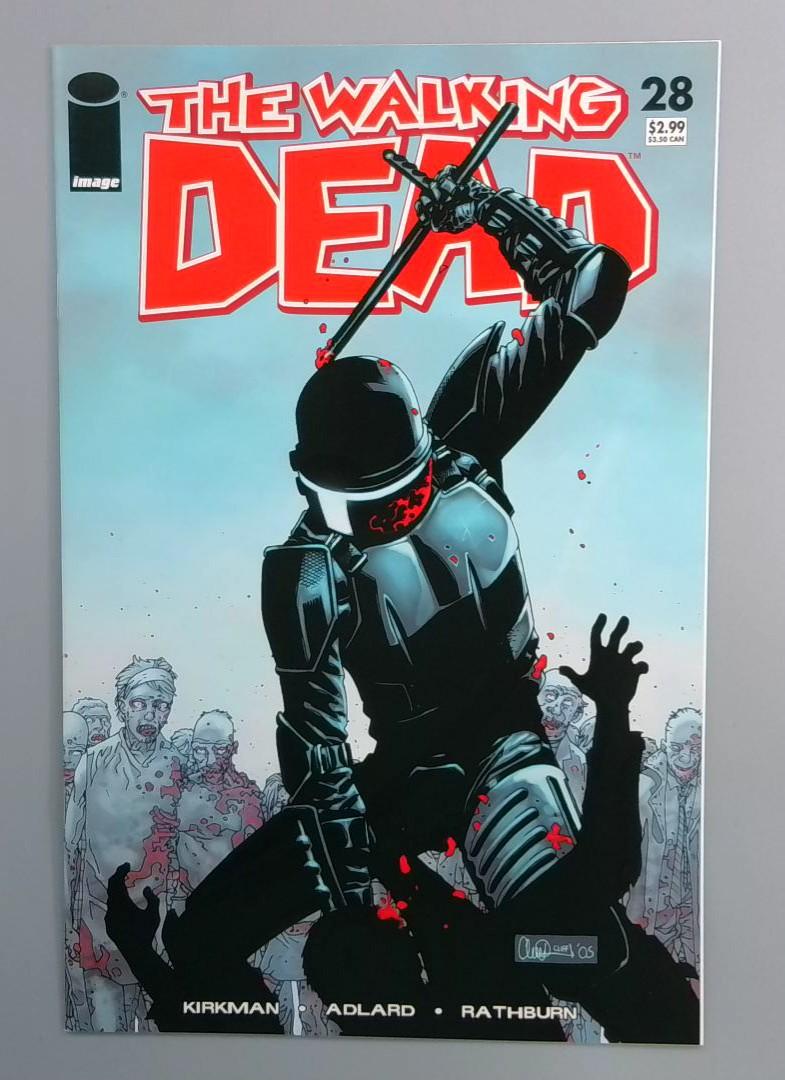 Walking Dead #28 NM- Rick loses his Hand Image $2.99